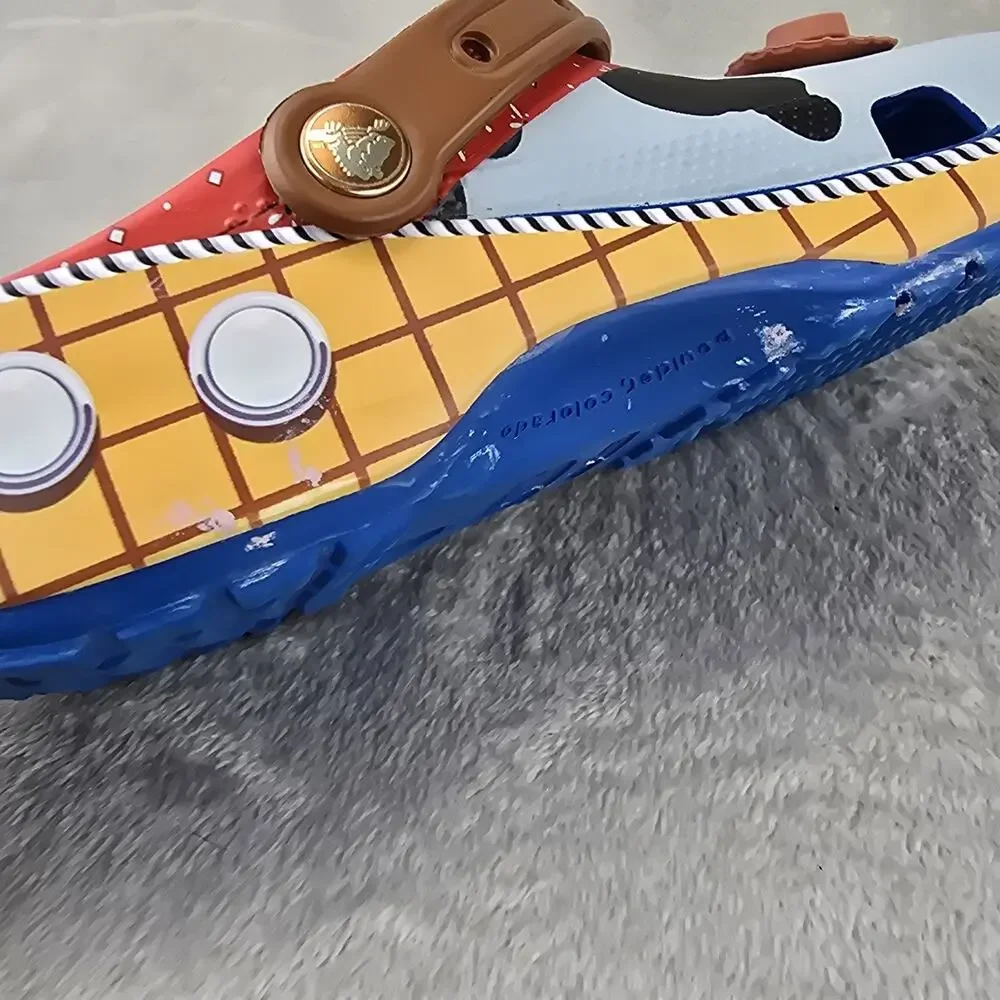 Crocs Toy Story Woody Shoe Mens Size 11 Clogs Disney Pixar Cow Print Womens 12.5